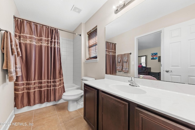 full bathroom featuring tile flooring, oversized vanity, toilet, and shower / bath combination with curtain