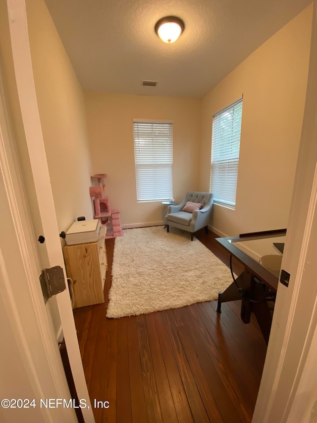 bedroom featuring hardwood / wood-style floors