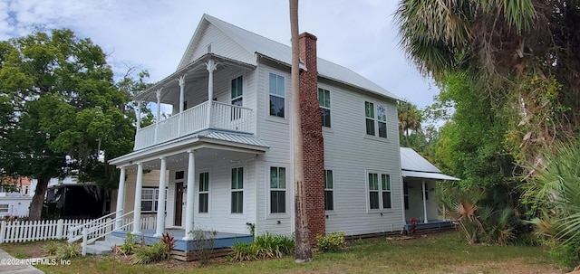 exterior space featuring a balcony