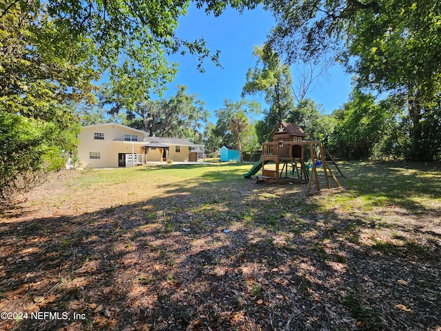 view of yard featuring a playground