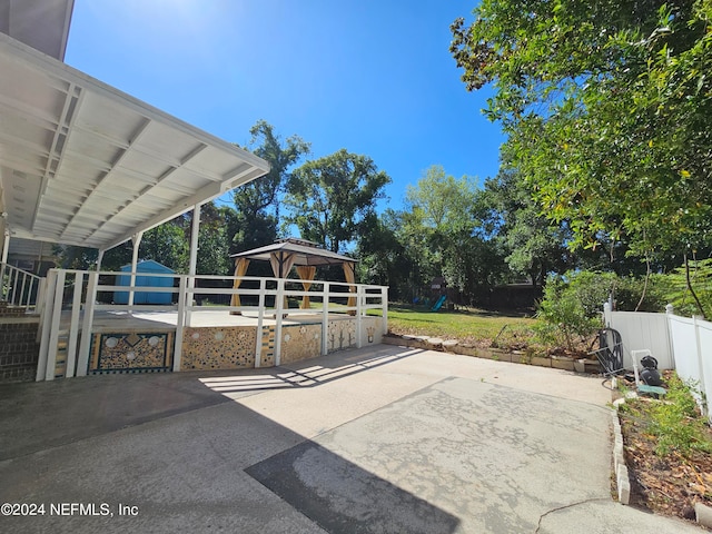 view of patio / terrace featuring a storage shed