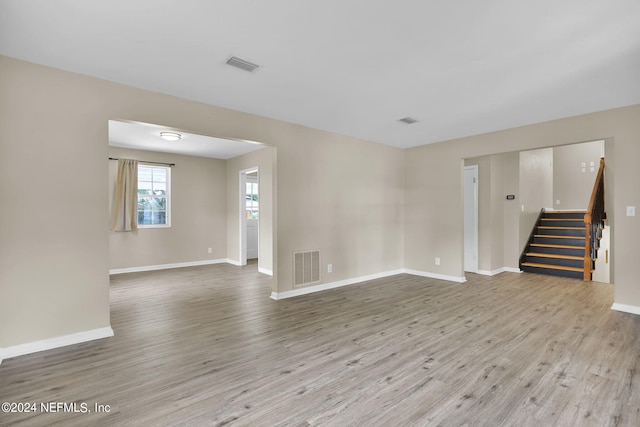 empty room with light wood-type flooring