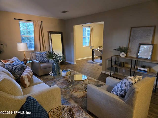 living room with dark wood-type flooring