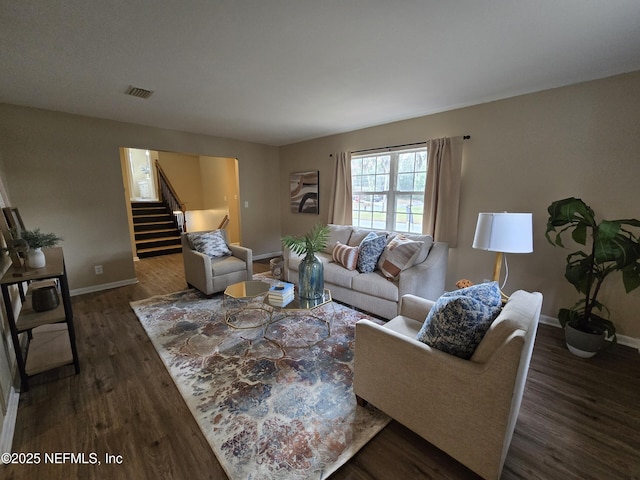 living room with dark hardwood / wood-style floors