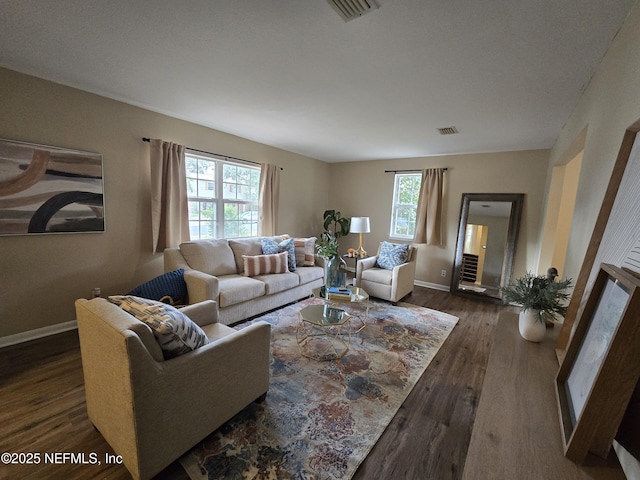 living room with dark hardwood / wood-style floors