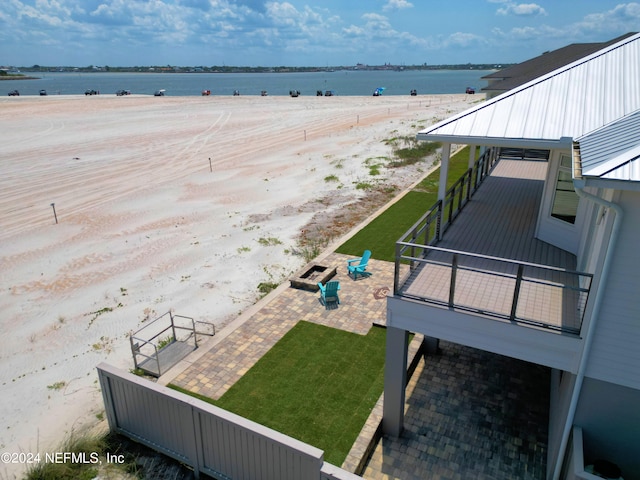 exterior space featuring a beach view