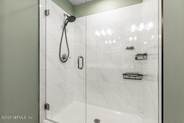 full bathroom with a shower stall