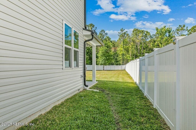 view of yard featuring a fenced backyard