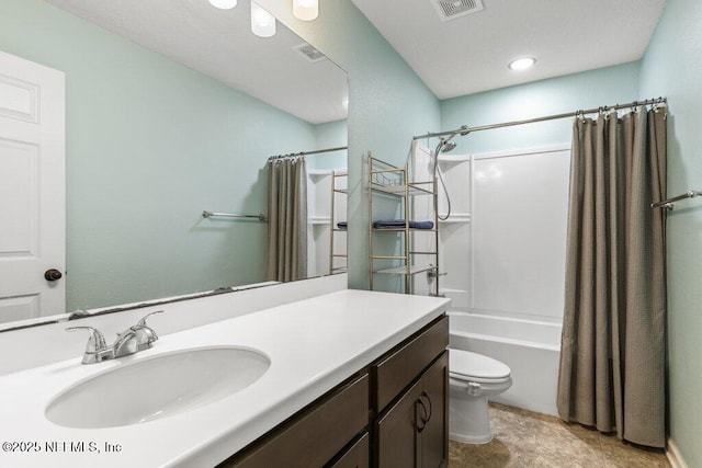 bathroom featuring shower / tub combo, visible vents, vanity, and toilet