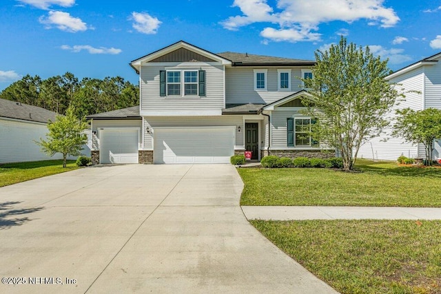 craftsman house with stone siding, driveway, a front lawn, and a garage