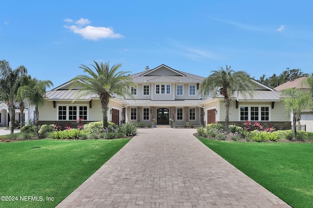 view of front of home featuring a front lawn