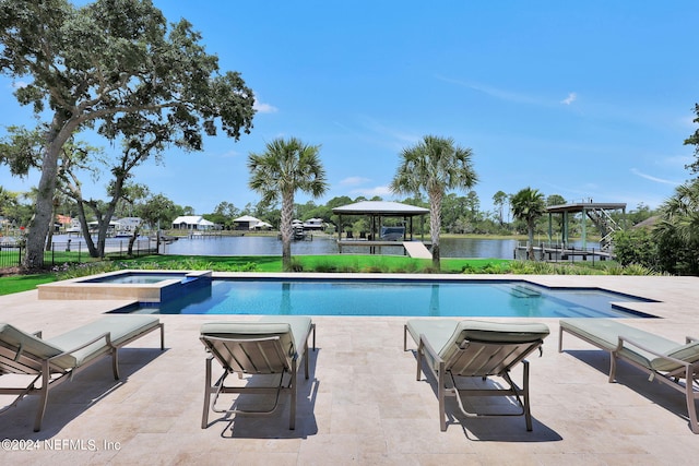 view of pool with a gazebo, a water view, an in ground hot tub, and a patio area