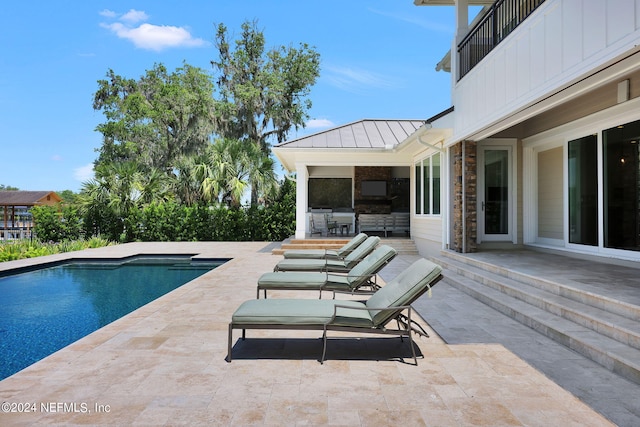 view of pool with a patio