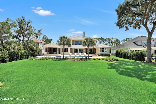 view of front of home with a gazebo, a front lawn, and a patio area