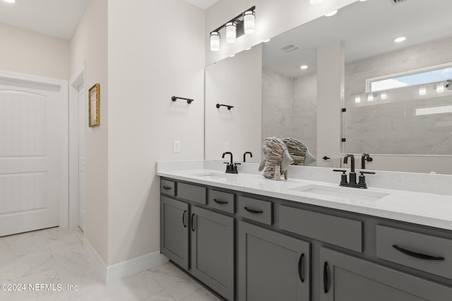 bathroom featuring dual vanity and tile flooring