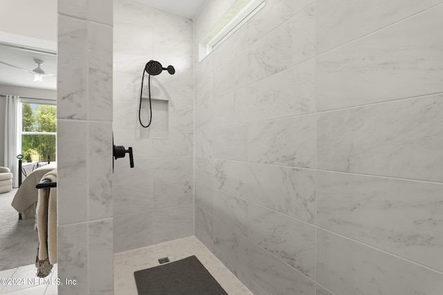 bathroom featuring tiled shower