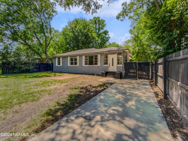 view of front of home with a front yard