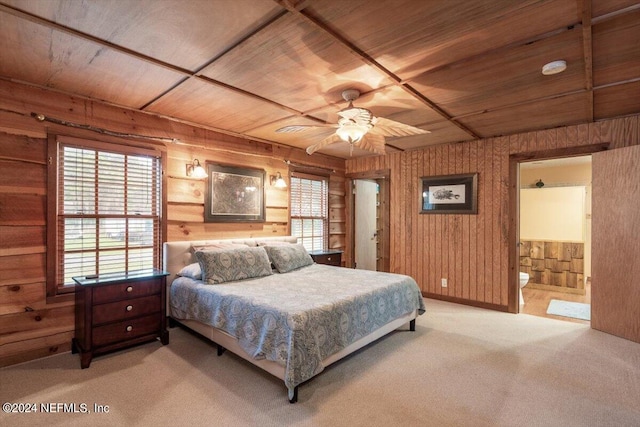 bedroom with wooden walls, carpet flooring, wood ceiling, and ceiling fan