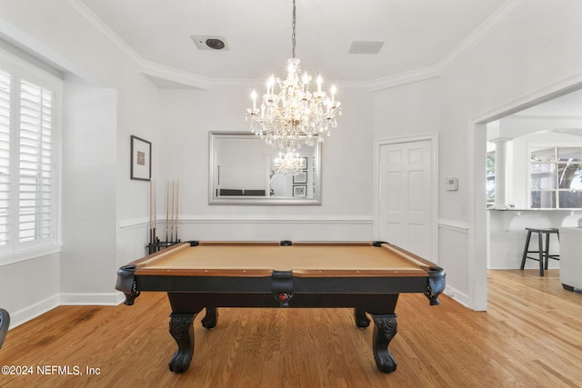 playroom featuring ornamental molding, light hardwood / wood-style floors, and plenty of natural light