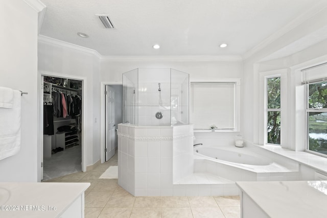 bathroom with vanity, tile patterned flooring, ornamental molding, and independent shower and bath