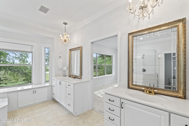 bathroom with crown molding, vanity, tile patterned floors, a chandelier, and walk in shower