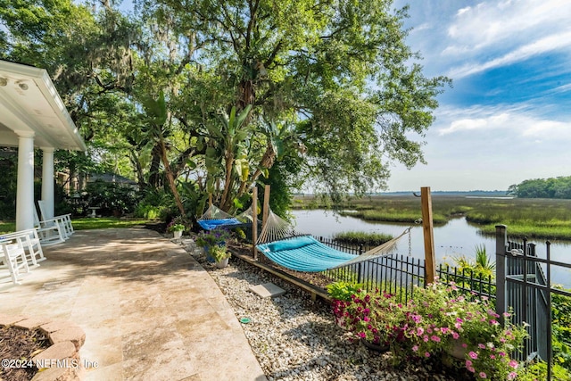 view of patio / terrace with a water view