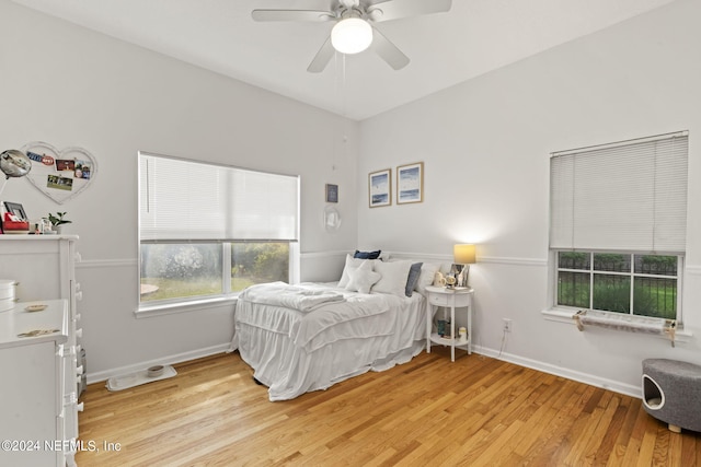 bedroom featuring light hardwood / wood-style flooring and ceiling fan