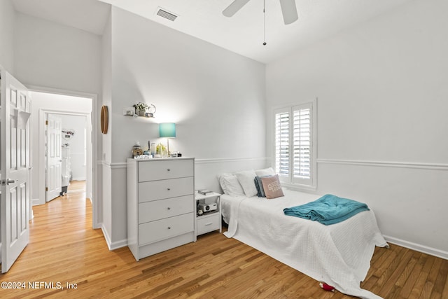 bedroom featuring ceiling fan and light wood-type flooring