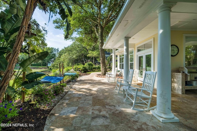 view of patio featuring a grill and french doors