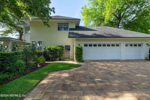 view of front of house with a garage