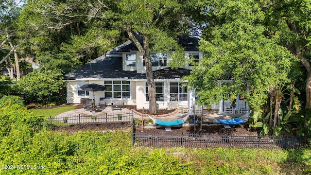 back of house featuring a patio