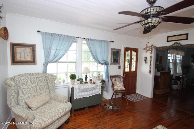 sitting room featuring wood-type flooring and ceiling fan