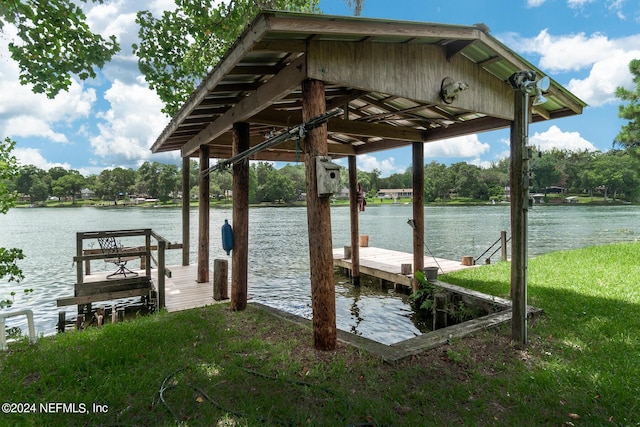 view of dock with a water view