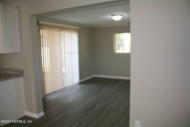 interior space with dark hardwood / wood-style flooring