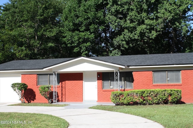 single story home featuring covered porch