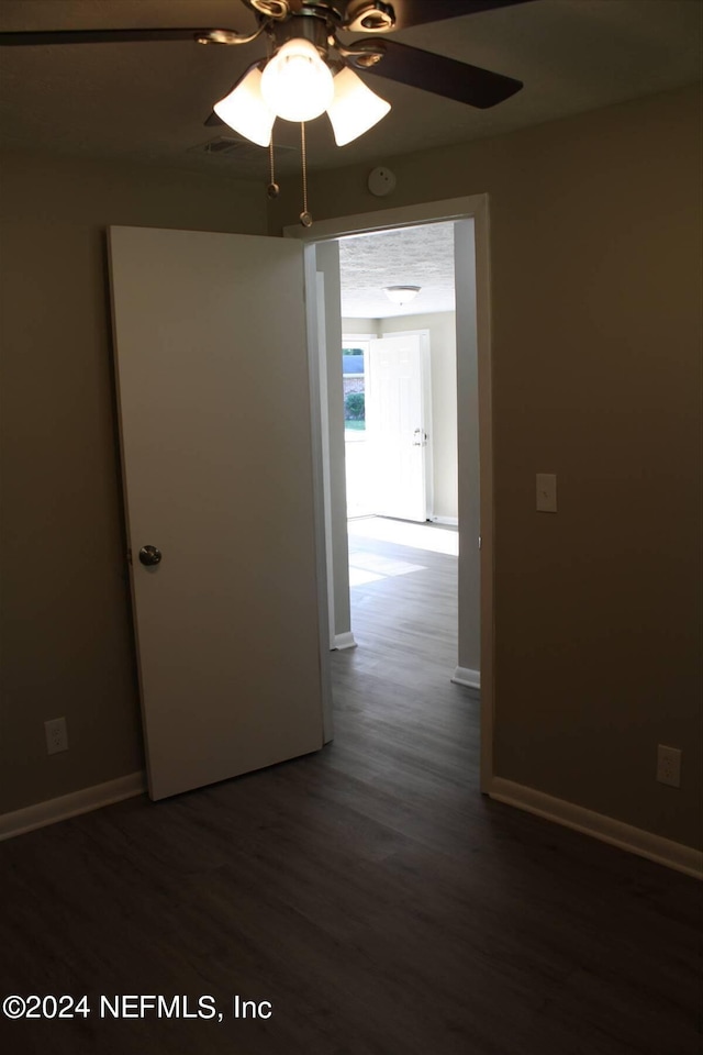 interior space with dark hardwood / wood-style flooring