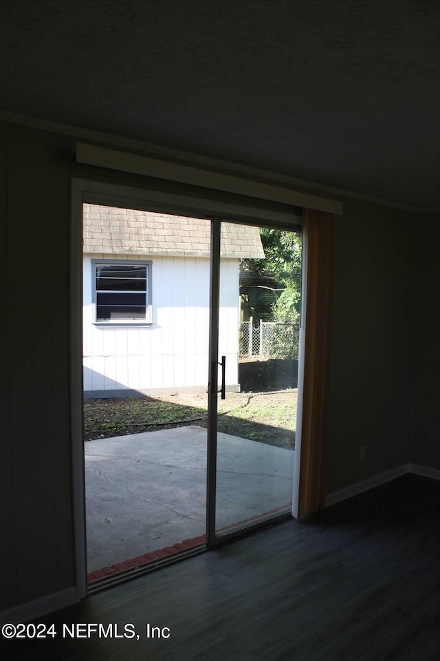 doorway featuring dark hardwood / wood-style flooring