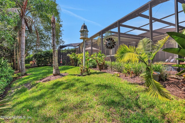 view of yard with a lanai