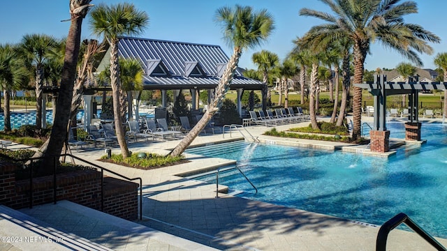 view of pool featuring a pergola and a patio area