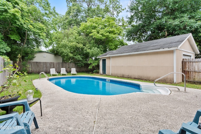 view of swimming pool with a patio