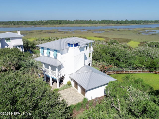 birds eye view of property featuring a water view