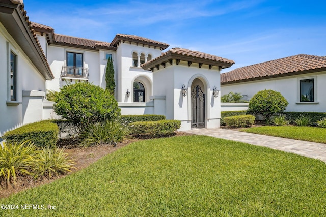 5275 Bentpine Cove Rd, Jacksonville, FL 32224 - mediterranean / spanish house with a tile roof and stucco siding