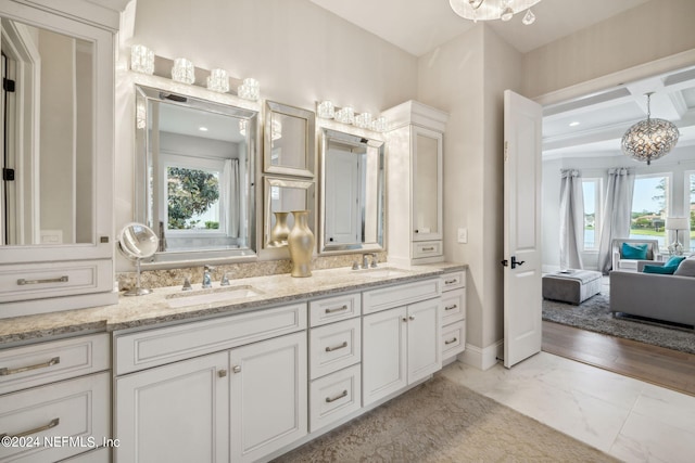 5275 Bentpine Cove Rd, Jacksonville, FL 32224 - full bath with a chandelier, marble finish floors, and double vanity