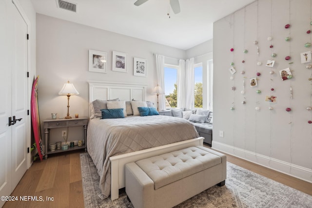 5275 Bentpine Cove Rd, Jacksonville, FL 32224 - bedroom featuring wood finished floors, baseboards, and ceiling fan