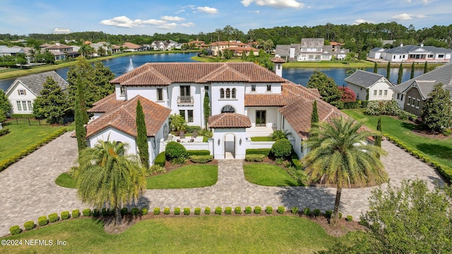 5275 Bentpine Cove Rd, Jacksonville, FL 32224 - view of front of house featuring a tiled roof, a water view, stucco siding, and a residential view