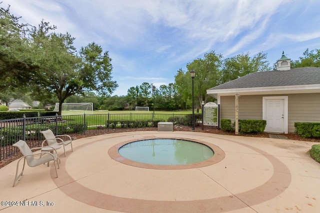 view of pool featuring a patio