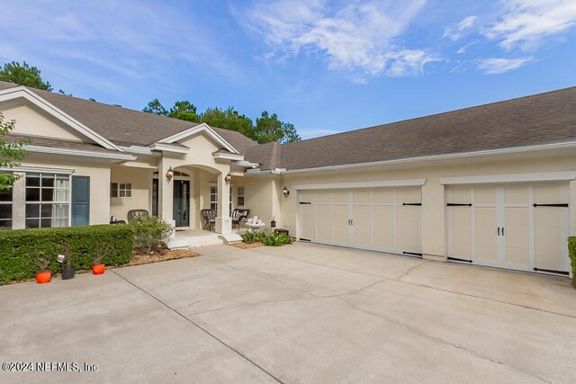 single story home with a garage