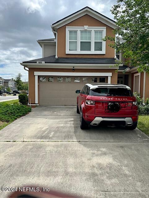 view of front of home featuring a garage