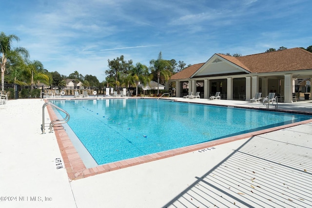 view of pool with a patio area