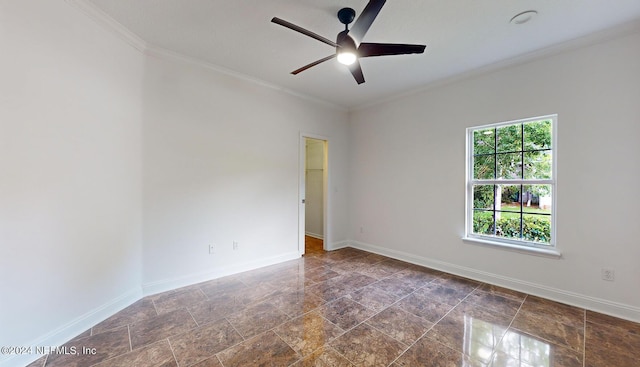 unfurnished room with ceiling fan and crown molding